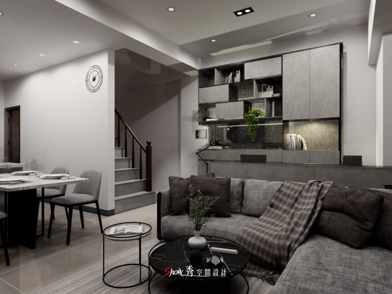 台南善化吳宅公共空間，沙發背牆結合層架展示設計